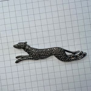 Greyhound brooch - silvertone along with metal tie clip.